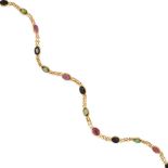 AN 18K GOLD, SAPPHIRE, AND RUBY BRACELET