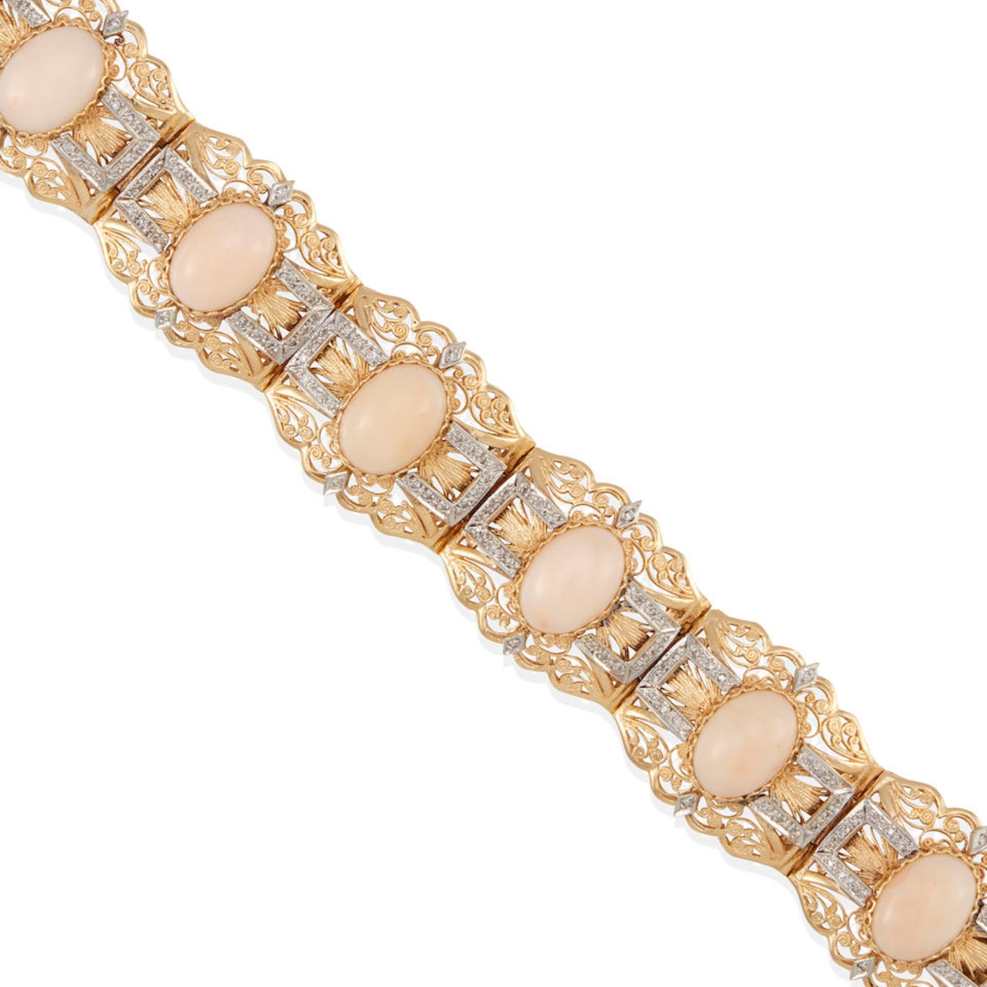 A 14K BI-COLOR GOLD, CORAL AND DIAMOND BRACELET