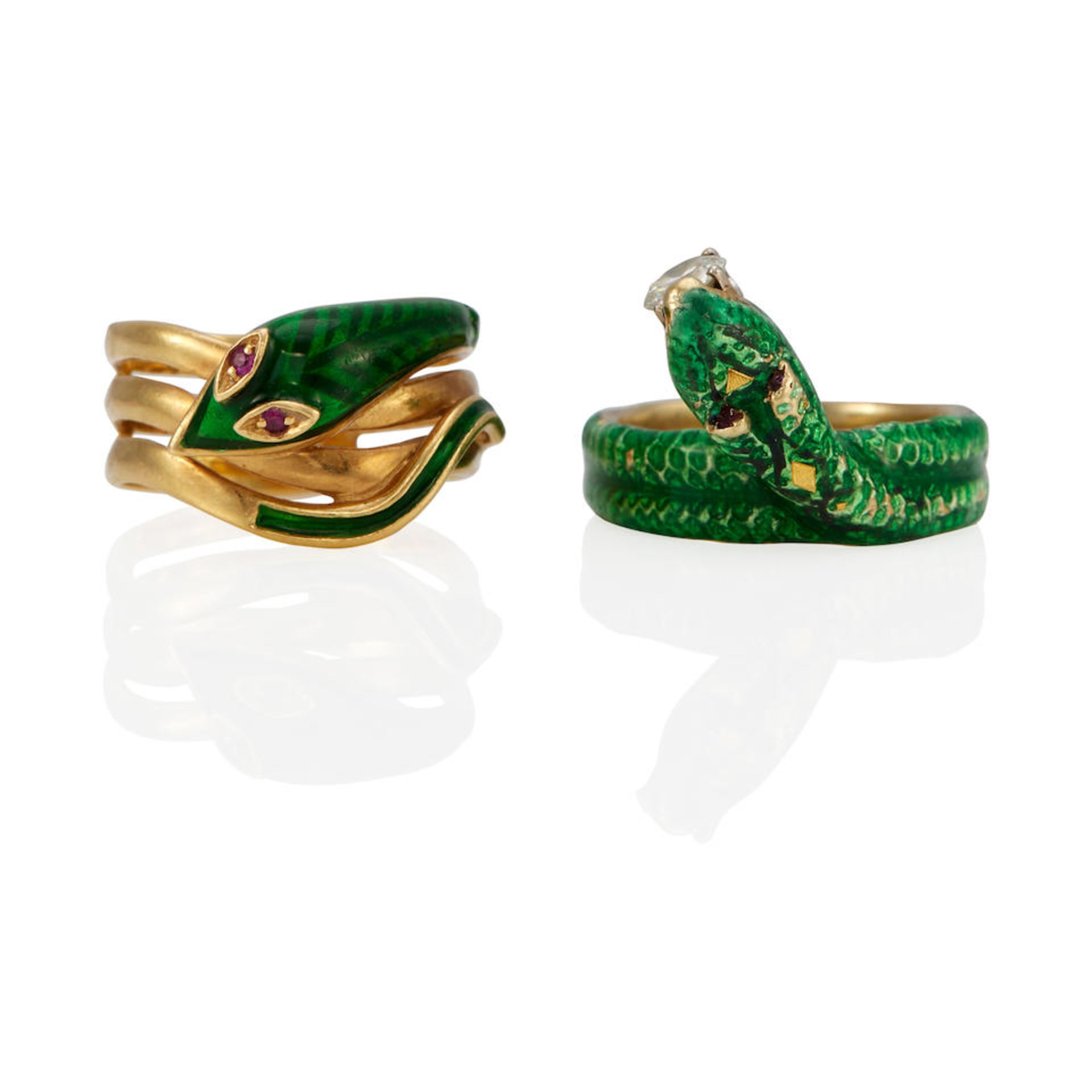 TWO GOLD, GREEN ENAMEL RUBY AND DIAMOND SNAKE RINGS