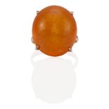 A 14K ROSE GOLD AND RECONSTRUCTED AMBER RING