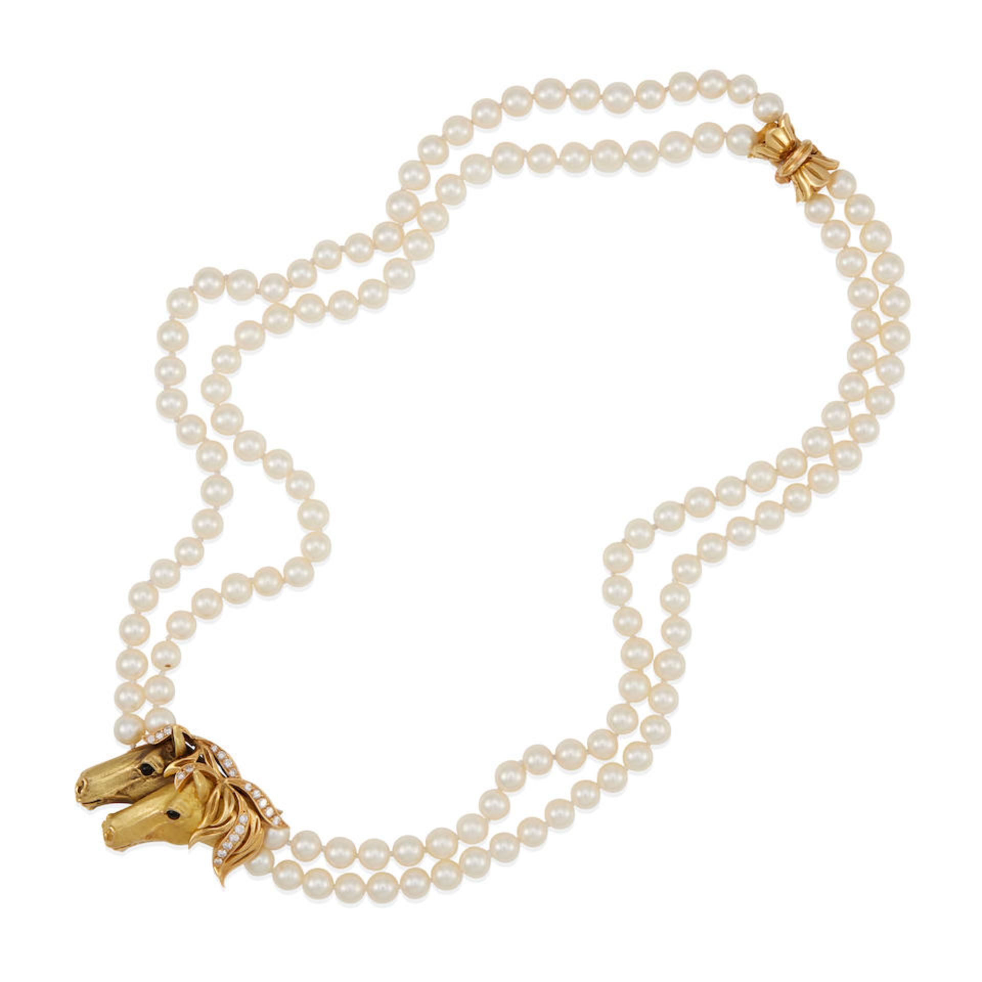 AN 18K GOLD, CULTURED PEARL ONYX AND DIAMOND NECKLACE