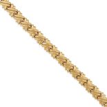 AN 18K GOLD BRACELET