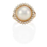 AN 18K GOLD, MABÉ PEARL AND DIAMOND RING