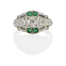 A 18K WHITE GOLD, EMERALD AND DIAMOND RING