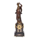 A NAPOLEON III PATINATED BRONZE, CHAMPLEVÉ ENAMEL, BLACK SLATE, AND BRASS CONICAL FIGURAL C...