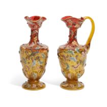 A PAIR OF MOSER GILT AND ENAMELLED AMBERINA GLASS PITCHERSLate 19th century