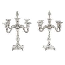 TWO SIMILAR STERLING SILVER WEIGHTED FIVE-LIGHT CANDELABRA one marked LM