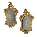A PAIR OF VENETIAN CARVED GILTWOOD ETCHED GLASS MIRRORS18th century