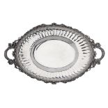 AN AMERICAN STERLING SILVER TWO-HANDLED FOOTED SERVING TRAY by Tiffany & Co., New York, New York...