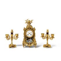 A LOUIS XVI STYLE GILT BRONZE AND ENAMEL THREE-PIECE CLOCK GARNITURE20th century