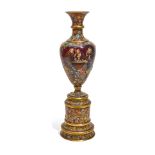 A MOSER GILT AND ENAMELED RUBY GLASS BALUSTER VASE ON STANDCirca 1900