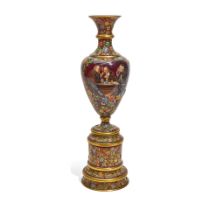 A MOSER GILT AND ENAMELED RUBY GLASS BALUSTER VASE ON STANDCirca 1900