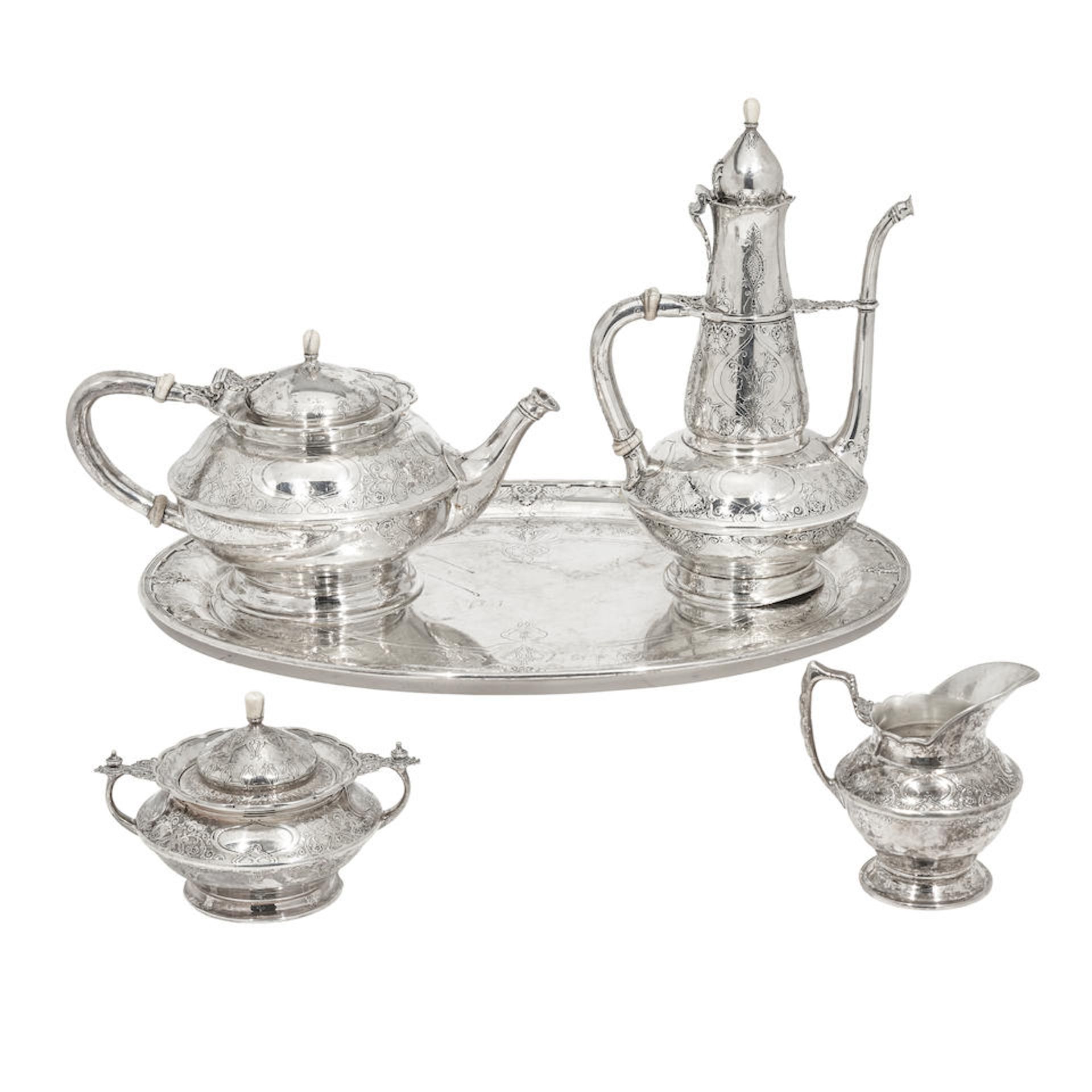 AN ASSEMBLED AMERICAN STERLING SILVER FIVE-PIECE TEA AND COFFEE SERVICE by Tiffany & Co., New Yo...