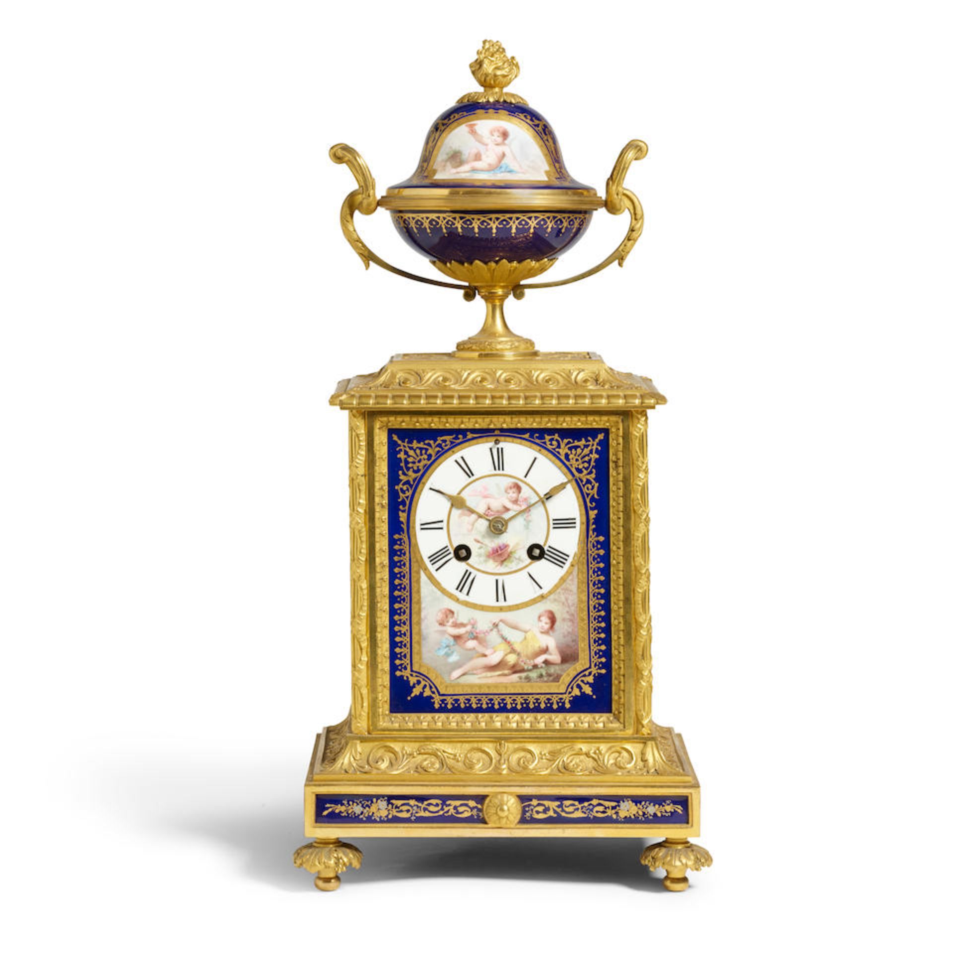 A LOUIS XVI STYLE GILT BRONZE MANTEL CLOCK WITH SÈVRES STYLE PORCELAIN PANELSLate 19th century