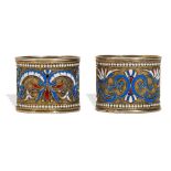 TWO RUSSIAN ENAMEL AND 84 SILVER NAPKIN RINGS Moscow, 1898-1906