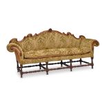 AN ITALIAN VELVET UPHOLSTERED CARVED WALNUT SOFA18th century