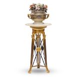 A FRENCH ENAMEL AND ONYX JARDINIÈRE ON A BLACK PAINTED METAL AND GILT BRONZE STANDEarly 20t...