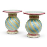 A PAIR OF MACKENZIE-CHILDS CERAMIC STOOLS/SIDE TABLES
