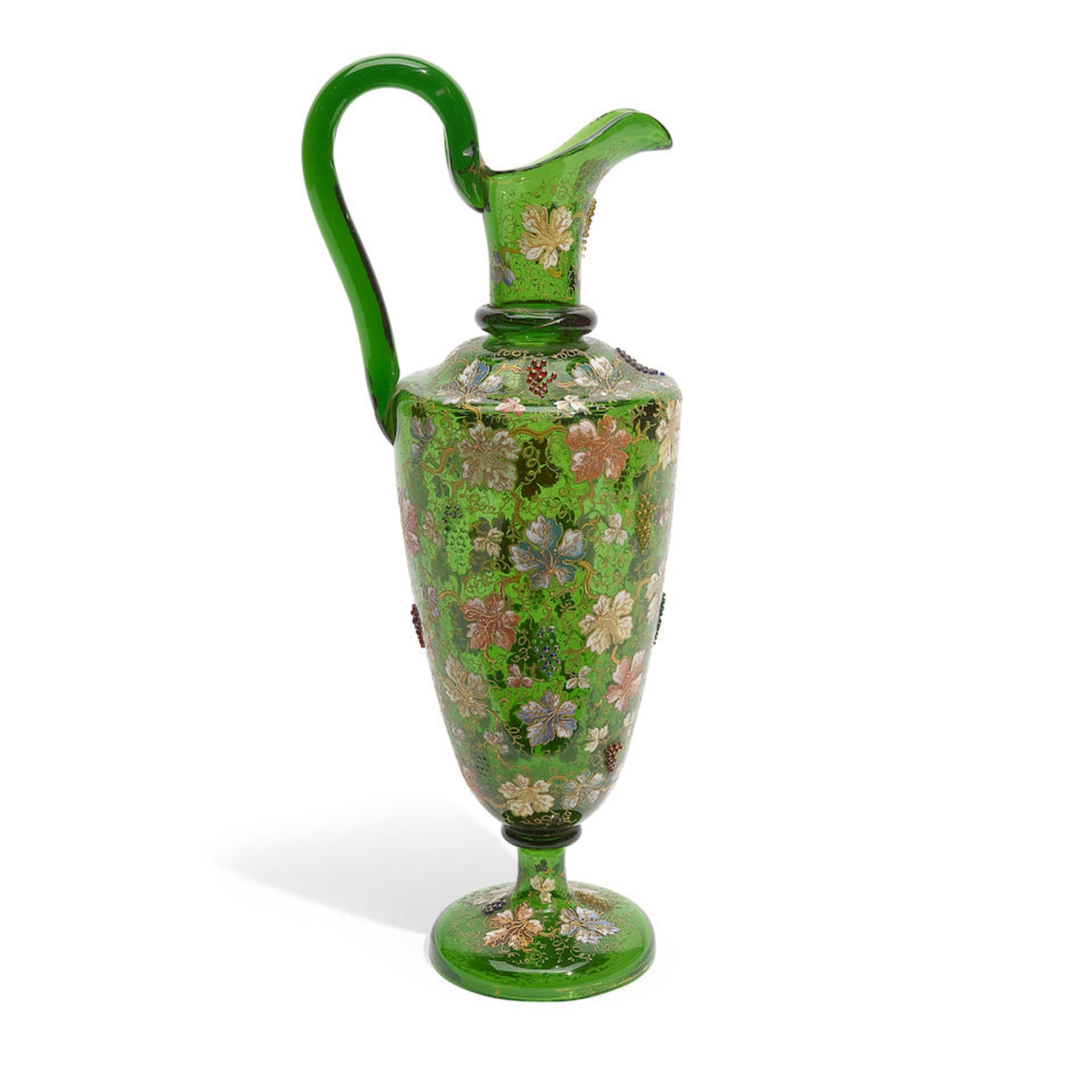 A MOSER GILT AND ENAMELLED GREEN GLASS EWERLate 19th century