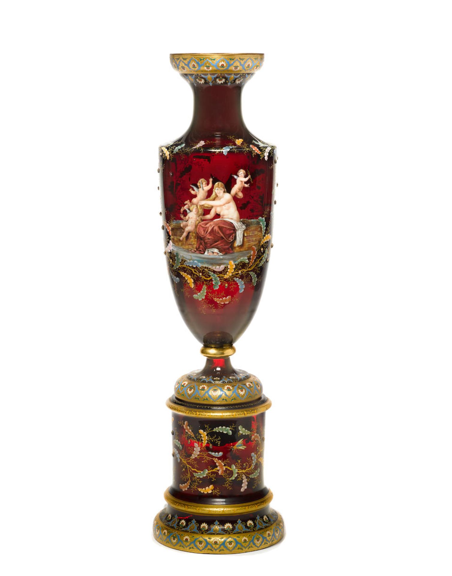 A MOSER GILT AND ENAMELLED RUBY GLASS VASE ON STANDCirca 1900
