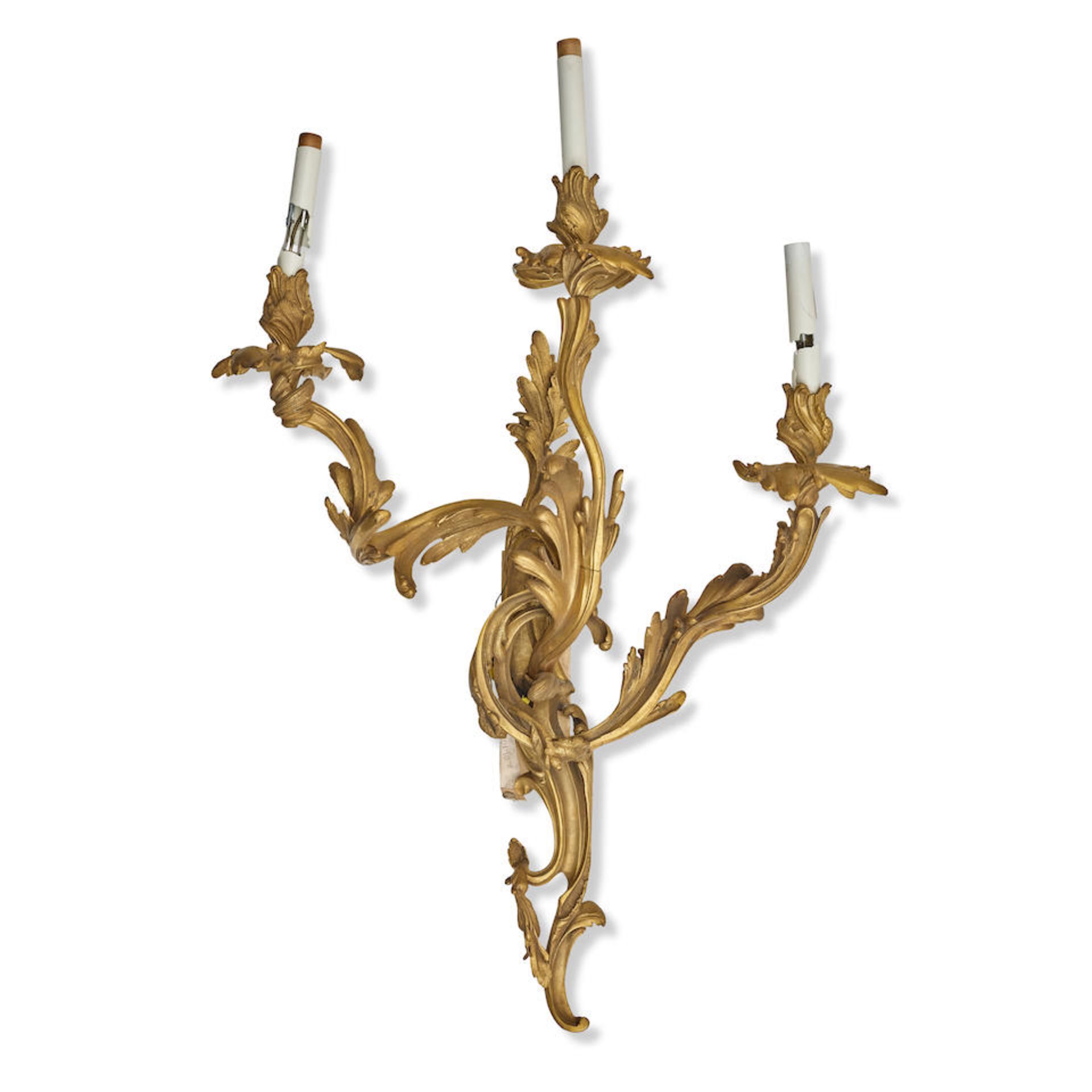 A LOUIS XV STYLE GILT BRONZE THREE-LIGHT SCONCE