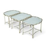 A REGENCY STYLE MIRRORED AND SILVERED METAL THREE-PIECE COFFEE TABLE20th century