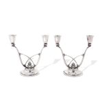 A PAIR OF DANISH STERLING SILVER TWO-LIGHT CANDELABRA designed by Harold Nielson (1892-1977) for...