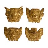 FOUR CONTINENTAL CARVED GILTWOOD APOSTLE WALL APPLIQUES