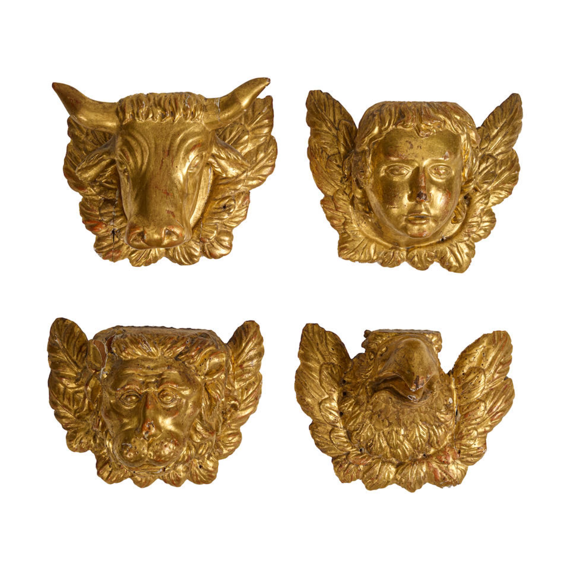 FOUR CONTINENTAL CARVED GILTWOOD APOSTLE WALL APPLIQUES