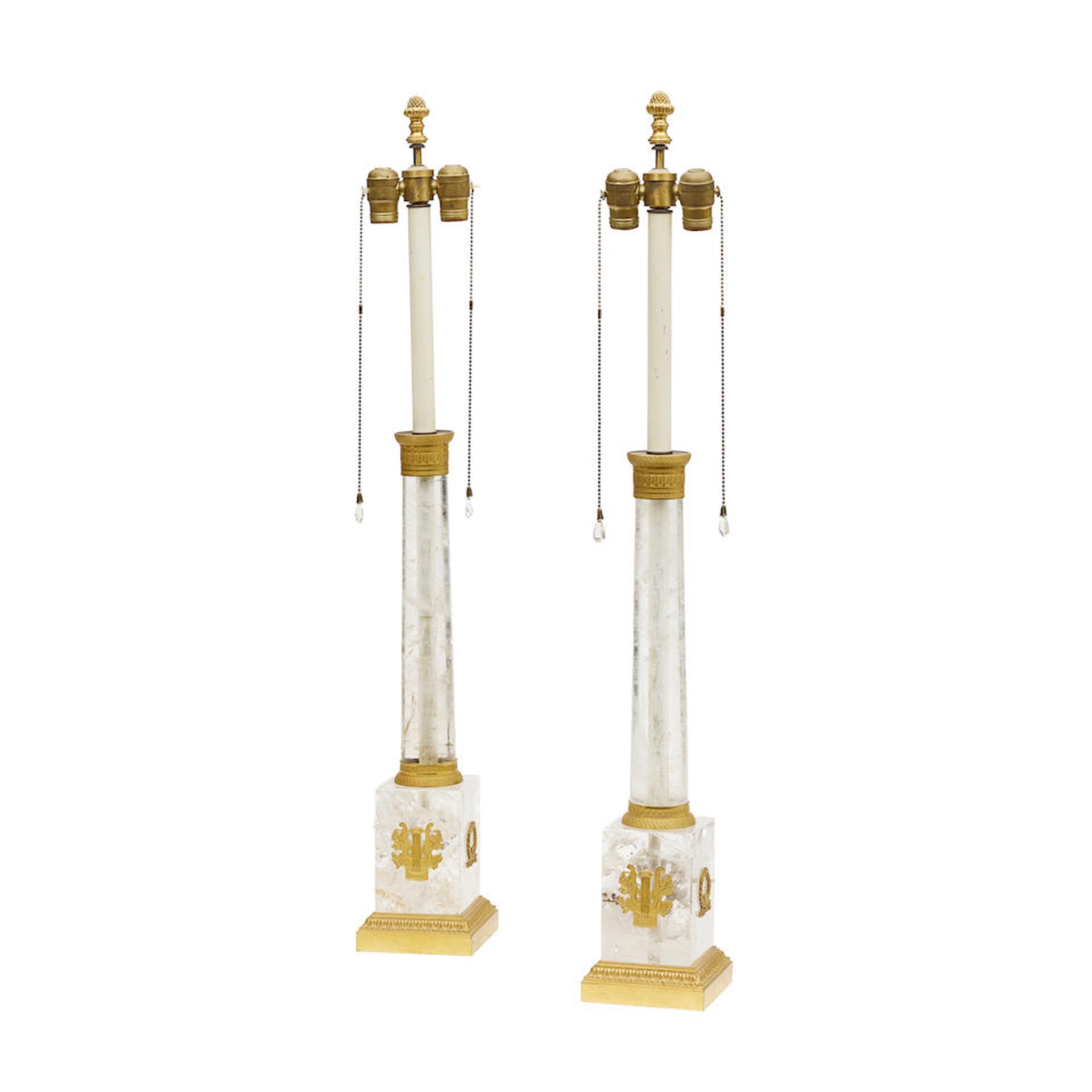A PAIR OF NEOCLASSICAL STYLE GILT BRONZE MOUNTED ROCK CRYSTAL COLUMNAR LAMPS20th century