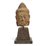 A CARVED STONE HEAD OF A BODHISATTVA20th century