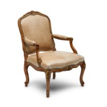 AN ERIKA BRUNSON DESIGNED LOUIS XV STYLE PARTIAL GILTWOOD FAUTEUIL