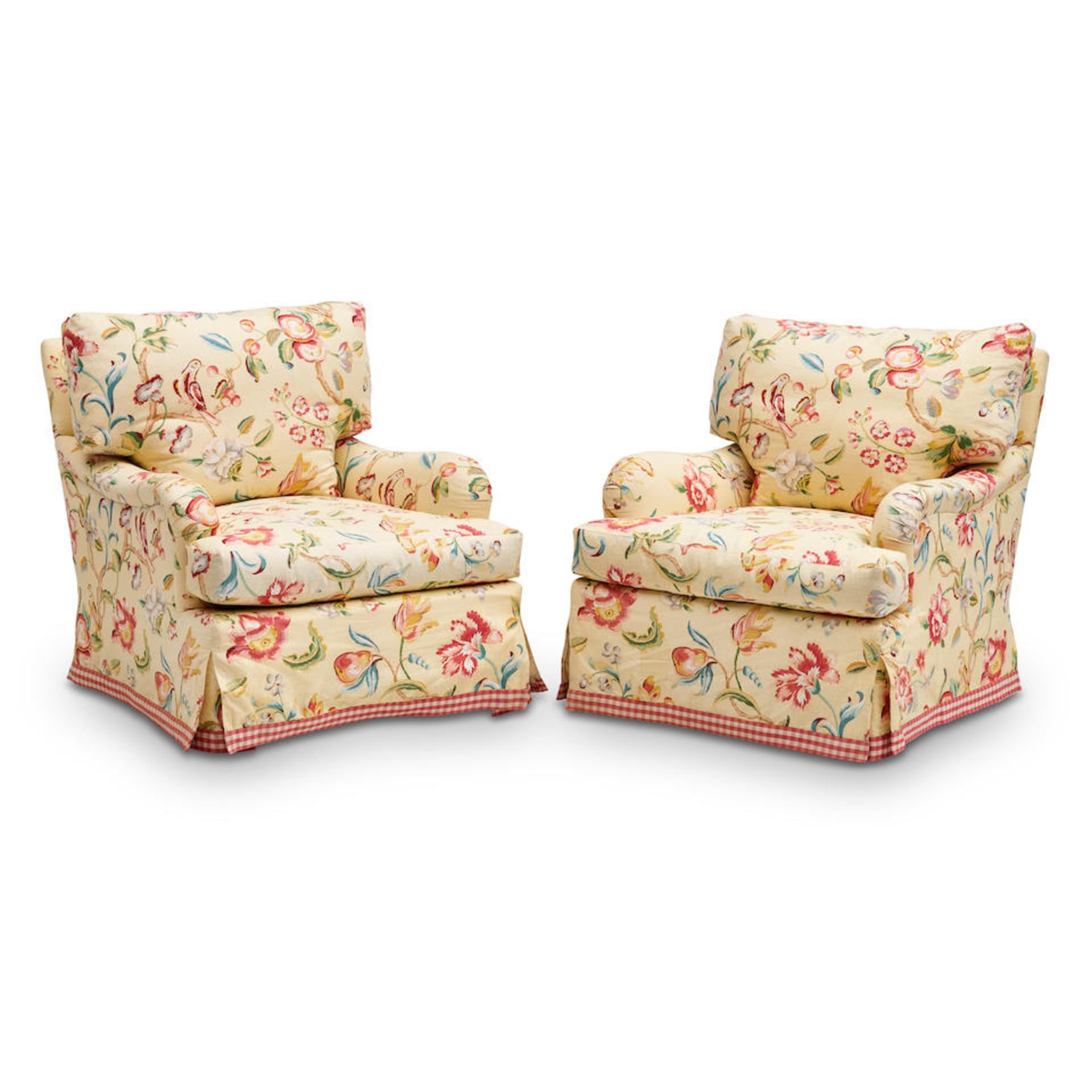 A PAIR OF UPHOLSTERED ARMCHAIRS