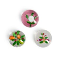 THREE FLOWERS AND FRUITS ON LATTICE GROUNDS GLASS PAPERWEIGHTS, France, fushia, ht. 1 3/4, fruit...