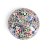 BACCARAT CLOSE-PACKED MILLEFIORI GLASS PAPERWEIGHT, France, dated 1847, several silhouette canes...