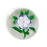 FRENCH GLASS PAPERWEIGHT WITH A SINGLE FLOWER, ht. 1 3/4, dia. 2 1/2 in.