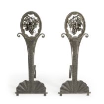 PAIR OF WROUGHT IRON ANDIRONS BEARING THE SIGNATURE OF EDGAR BRANDT, third quarter of the 20th c...