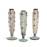 TWO DAUM GLASS VASES WITH APPLIED BERRIES TOGETHER WITH A SIMILAR VASE, two taller vases, Nancy,...