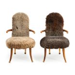 PAIR OF TOMMY SIMPSON (B.1939) ARMCHAIRS, United States, c. 2000, mixed hardwoods, sheep skin, u...