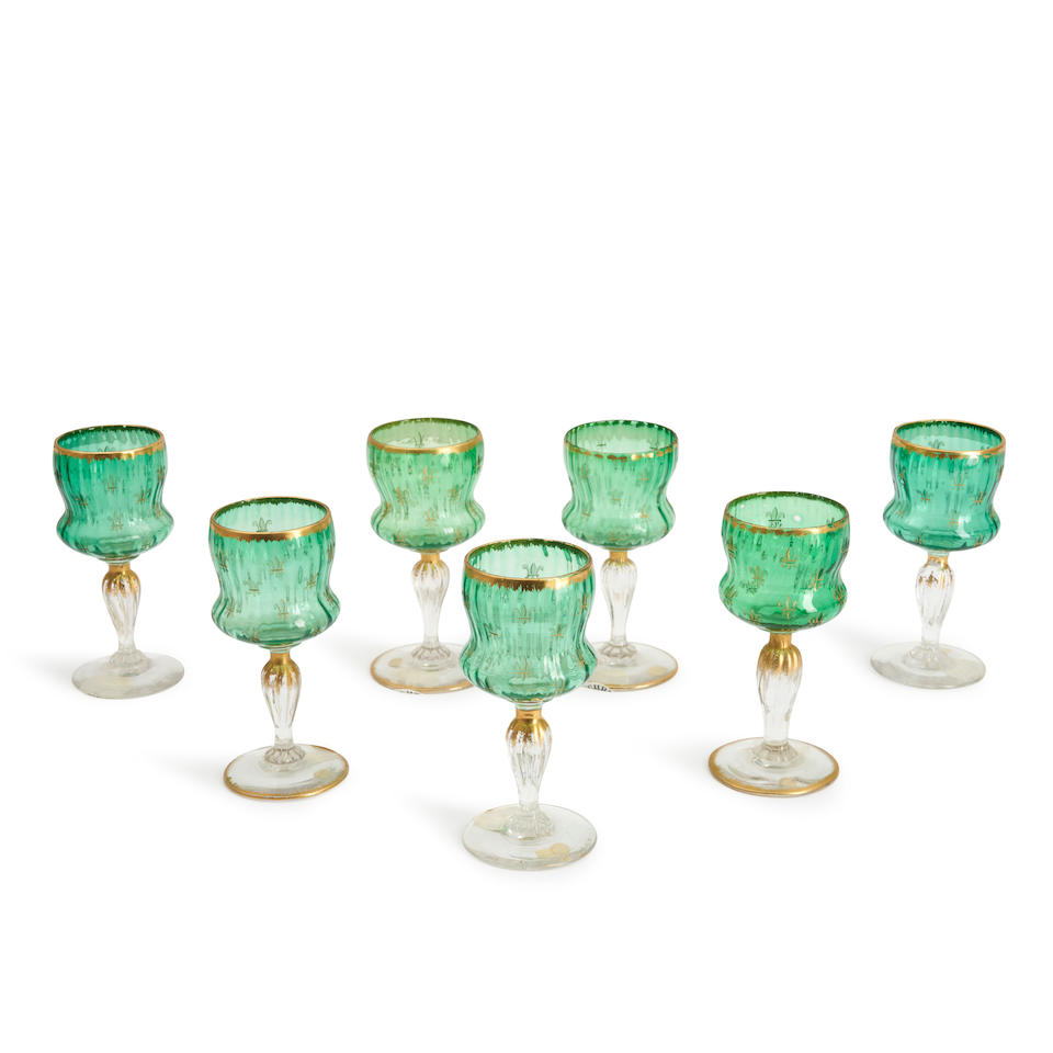 SEVEN DAUM ENGRAVED AND GILT GLASS CORDIAL GLASSES, Nancy, France, c. 1895, gilt paint mark 'Dau...