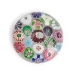 FRENCH MILLEFIORI SPACED GLASS PAPERWEIGHT, ht. 1 1/4, dia. 2 1/4 in.