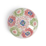 BACCARAT MILLEFIORI CIRCLETS GLASS PAPERWEIGHT, France, green and pink circles on upset muslin g...