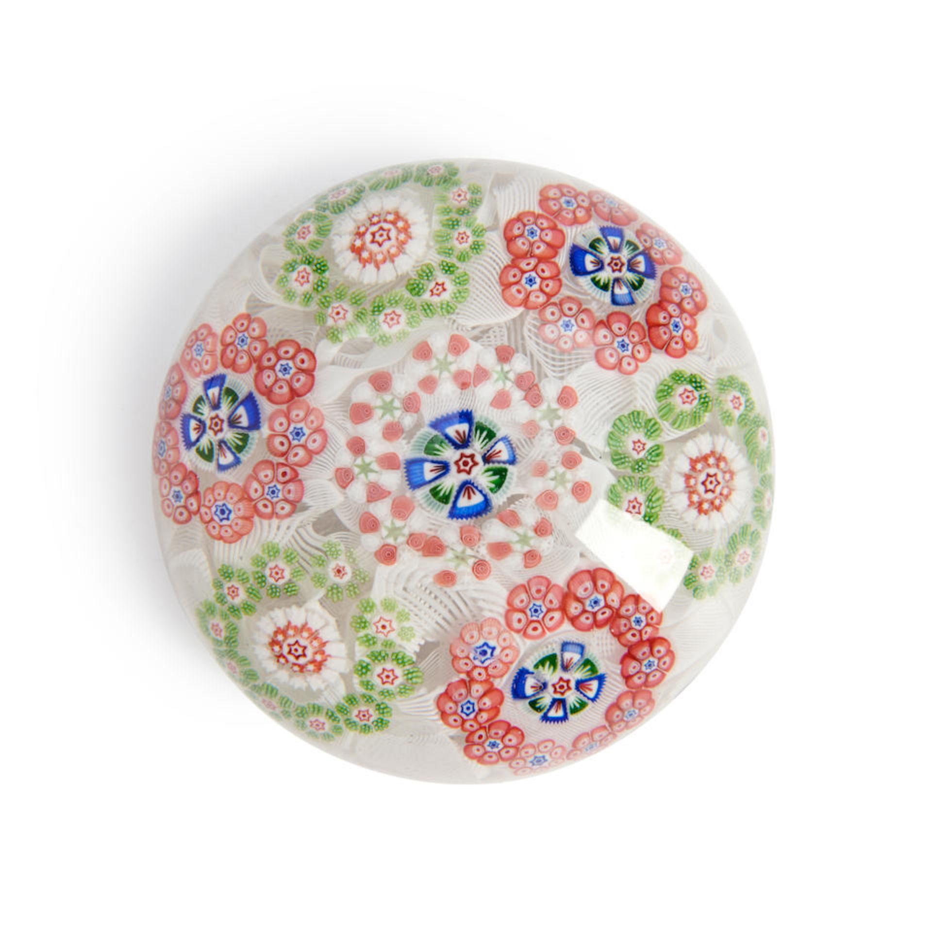 BACCARAT MILLEFIORI CIRCLETS GLASS PAPERWEIGHT, France, green and pink circles on upset muslin g...
