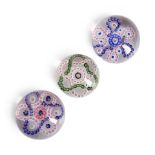 THREE ENTWINED GARLANDS MILLEFIORI GLASS PAPERWEIGHTS, France, paperweight with white and green ...