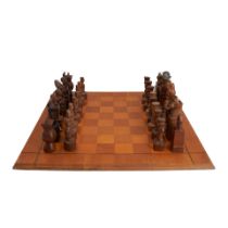 TRUMAN BAILEY CHESS SET AND BOARD, United States, dated 1957, walnut and other woods, metal, fig...