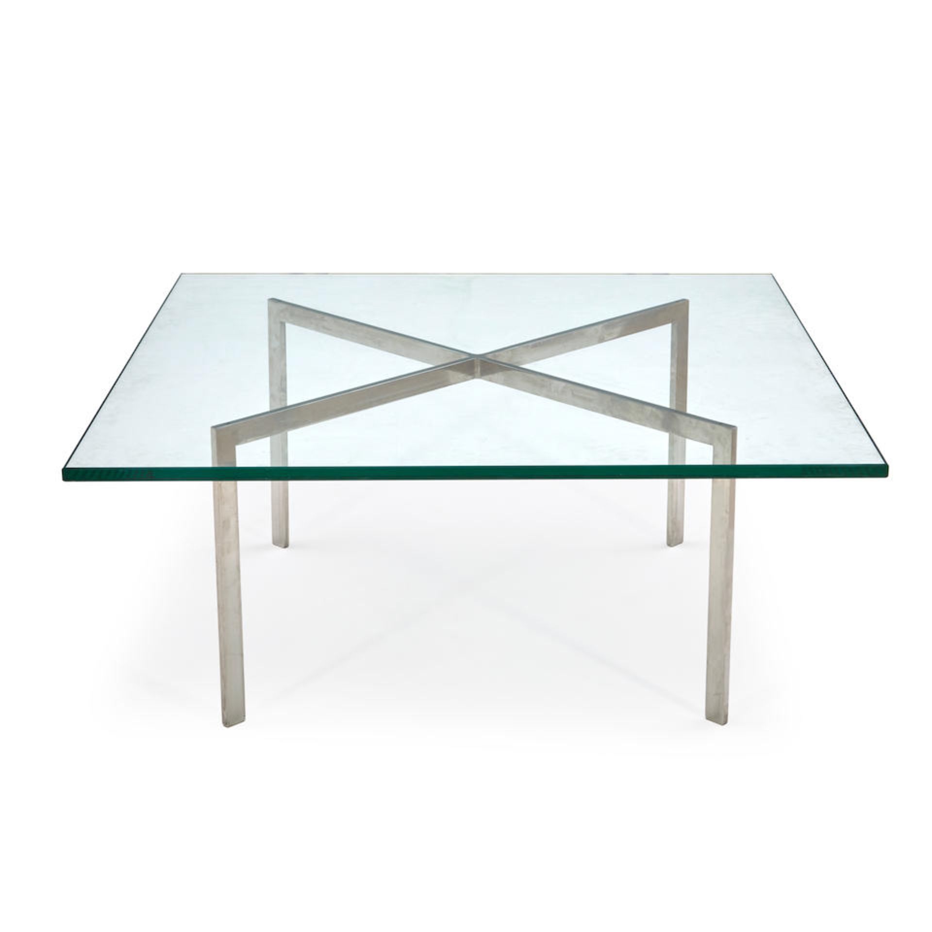 MIES VAN DER ROHE BARCELONA-STYLE COFFEE TABLE, late 20th century, chromed steel, glass, unmarke...