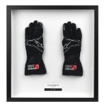 A signed pair of Michael Schumacher Mercedes AMG Petronas F1 2010 test spec gloves,
