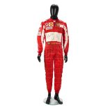 A signed set of used Rubens Barrichello Scuderia Ferrari Marlboro race overalls by Puma from the...