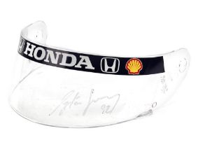 A Shoei Quattro X4 visor signed by Ayrton Senna,