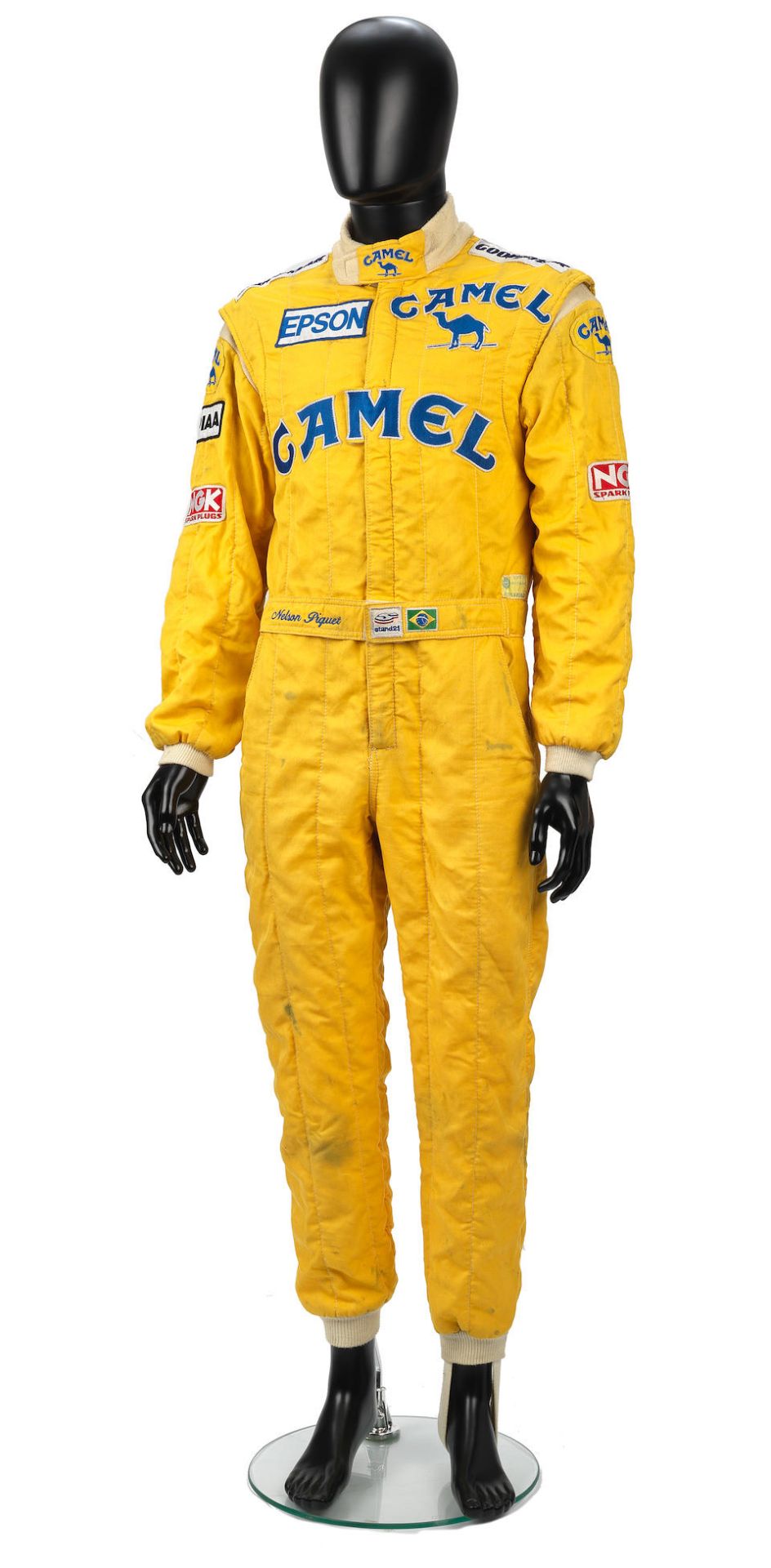 A set of used Nelson Piquet Camel Team Lotus race overalls by Stand 21 from the 1989 Formula 1 s...